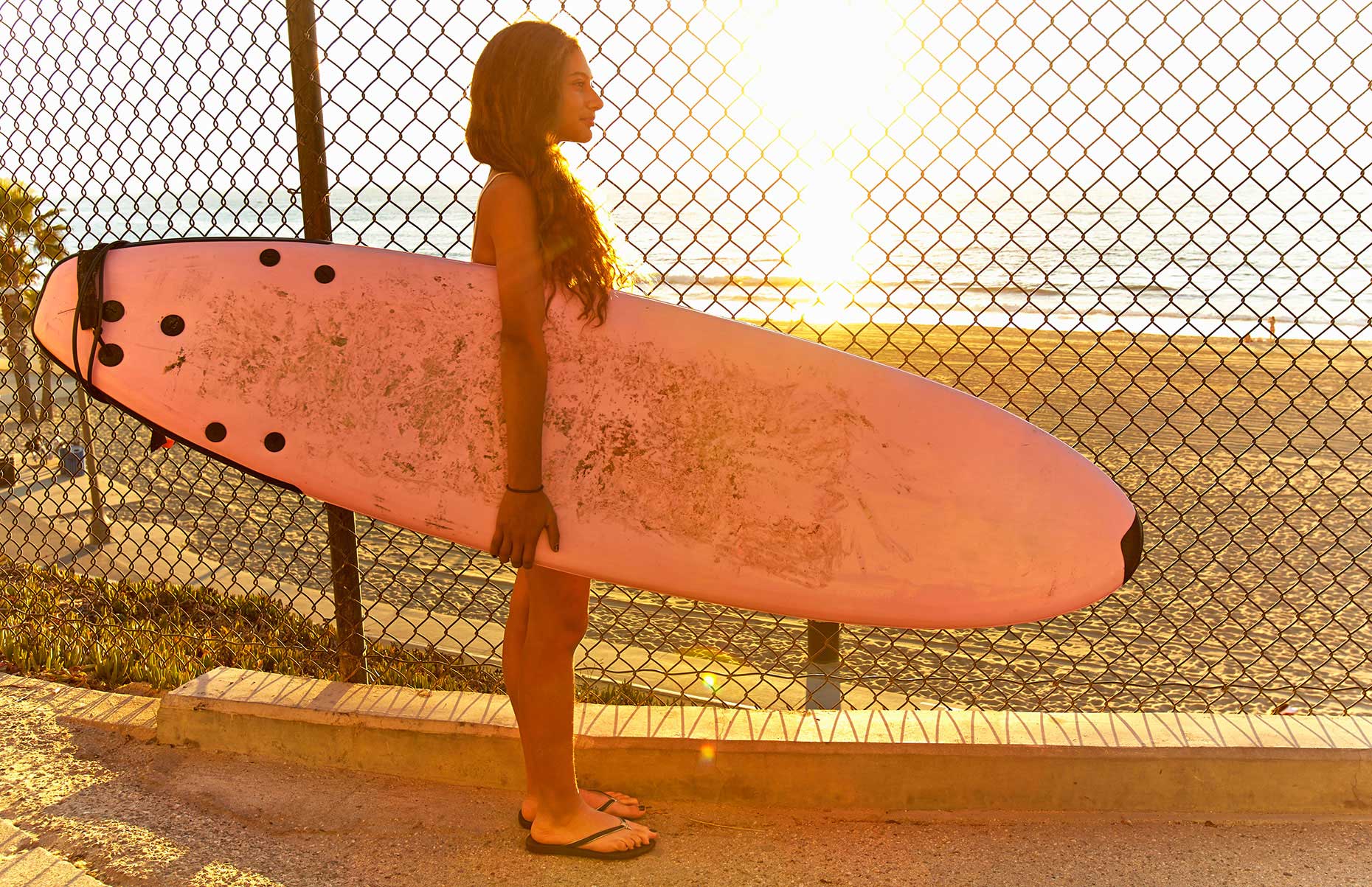 Photography_Children and Teens_Girl with Pink Surfboard-Tony Garcia