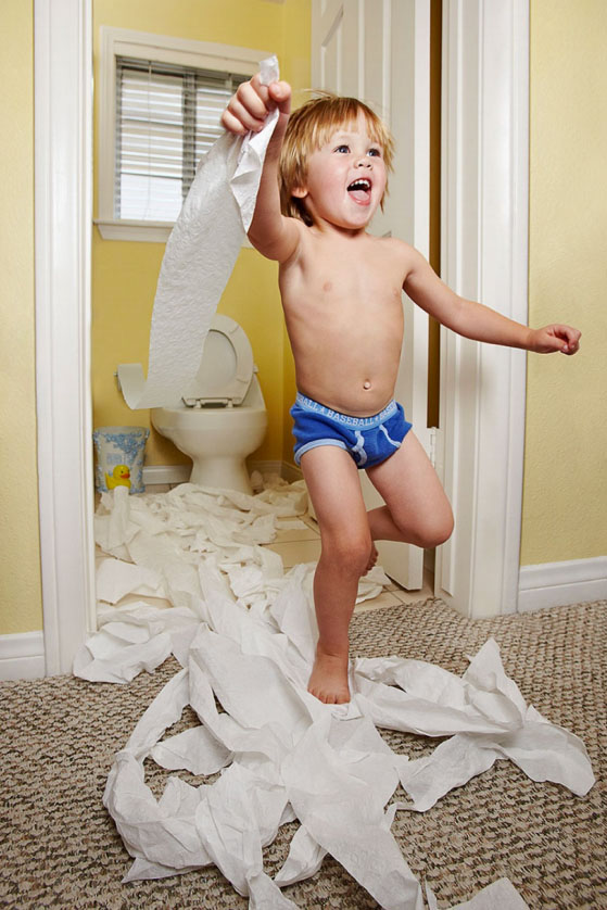 Photography_Children and Teens_Boy Menace Destroying Bathroom Toilet Paper-Tony Garcia