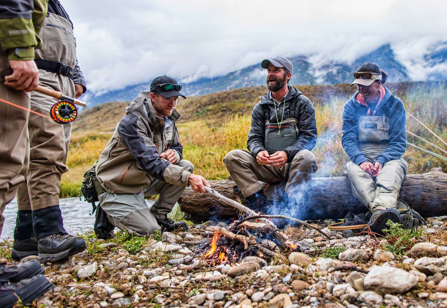 fly-fisherman-at-campfire-cooking-up-catch