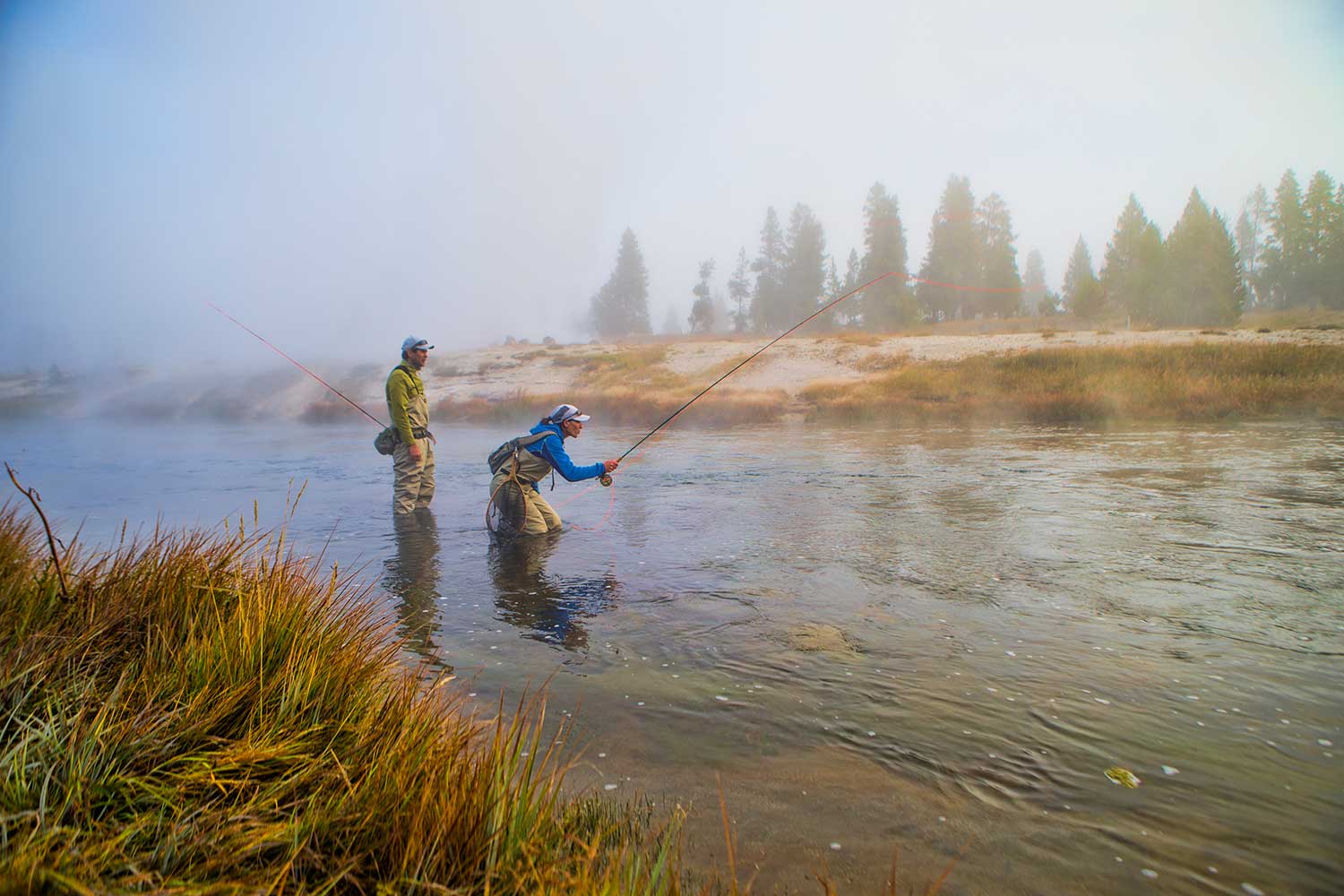 fly-fishermen-casting-on-foggy-river